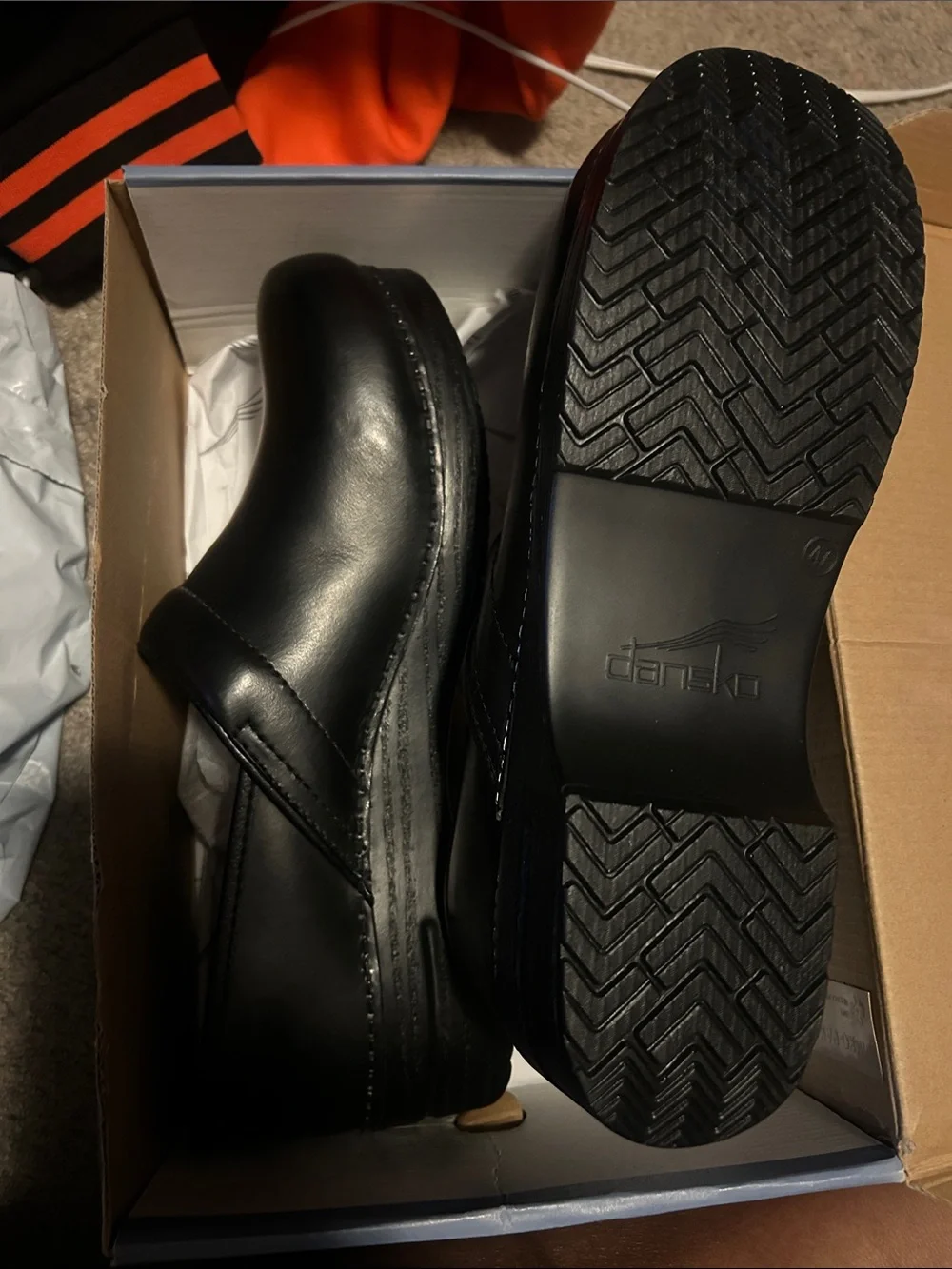 Dansko Black Slip-On Leather Clogs